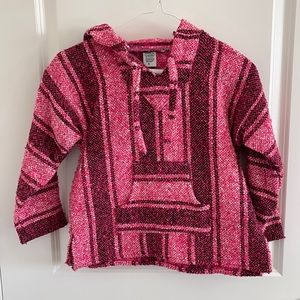 Adorable little girls bright pink poncho